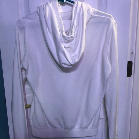 A white nike sweatshirt. - Picture 2 of 3